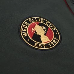 Mens Rugby World Cup 2023 Webb Ellis Pro Polo - Black Haze -Rugby Apparel rwc23 men webb ellis pro polo blk haze badge