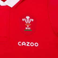 MACRON Wales Kids Classic Home Rugby Shirt - Long Sleeve Red 2023 9 MACRON Wales Kids Classic Home Rugby Shirt - Long Sleeve Red 2023 -Rugby Apparel wales kids classic home rugby shirt red badge